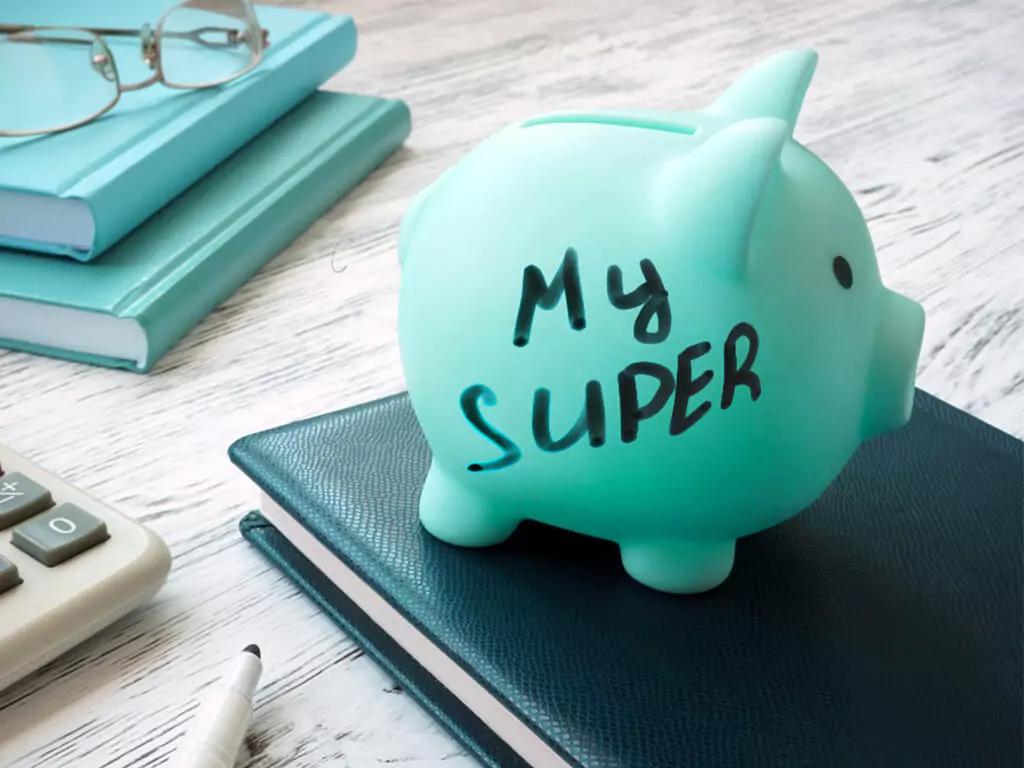 Superannuation planning with financial advisor, reviewing retirement savings and investment options.